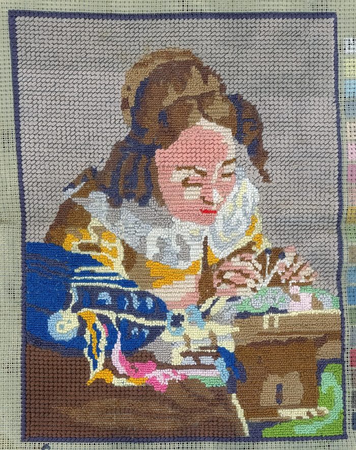 Vermeer's the Lace Maker what she making?